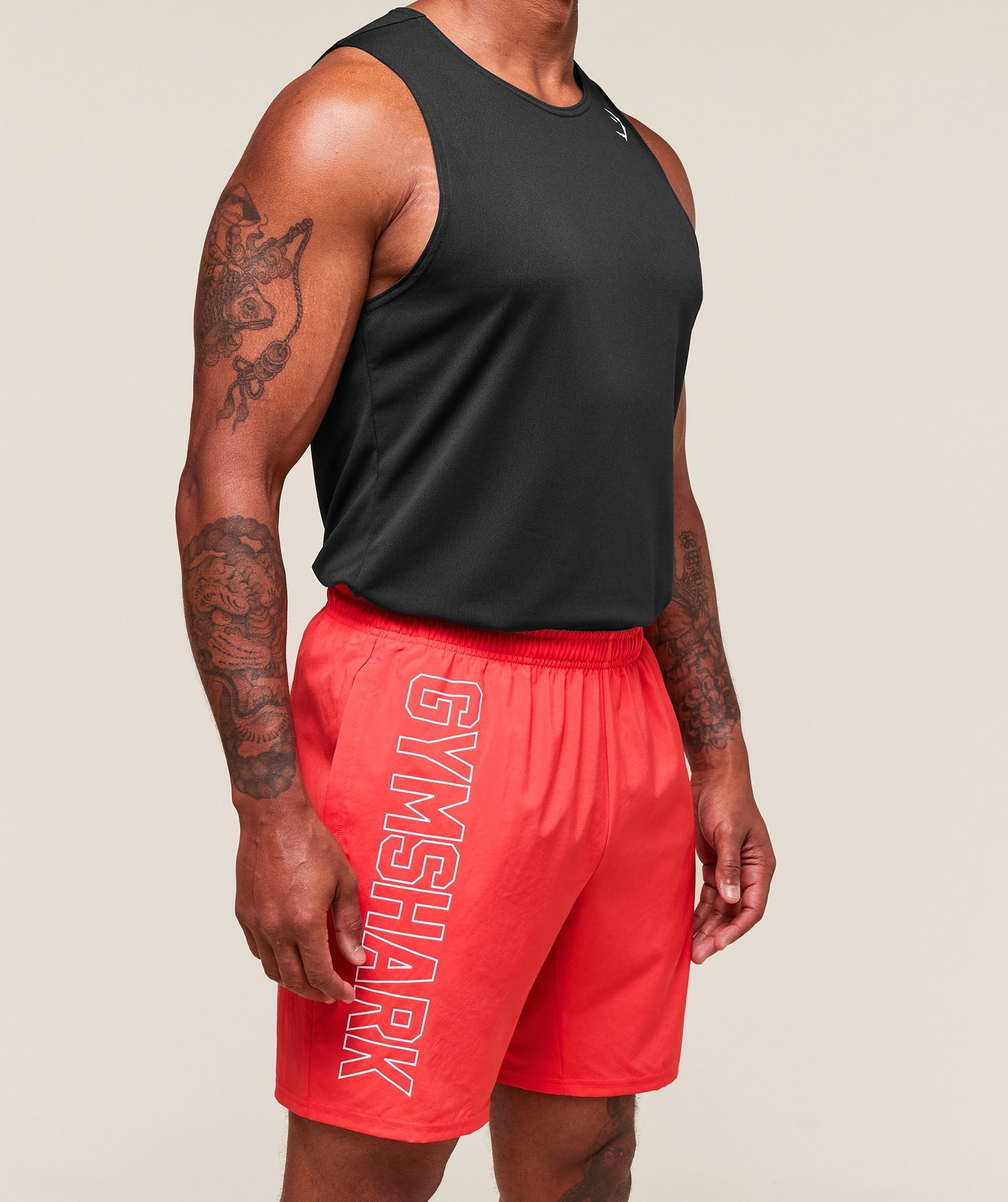 Gymshark Hybrid Athlete 7" Shorts - Coral Red