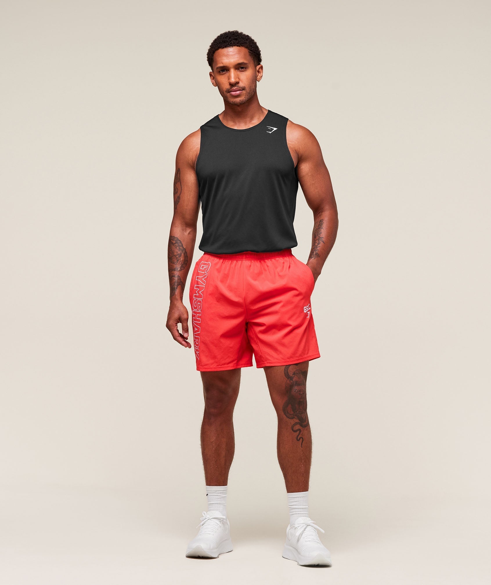 Gymshark Hybrid Athlete 7" Shorts - Coral Red