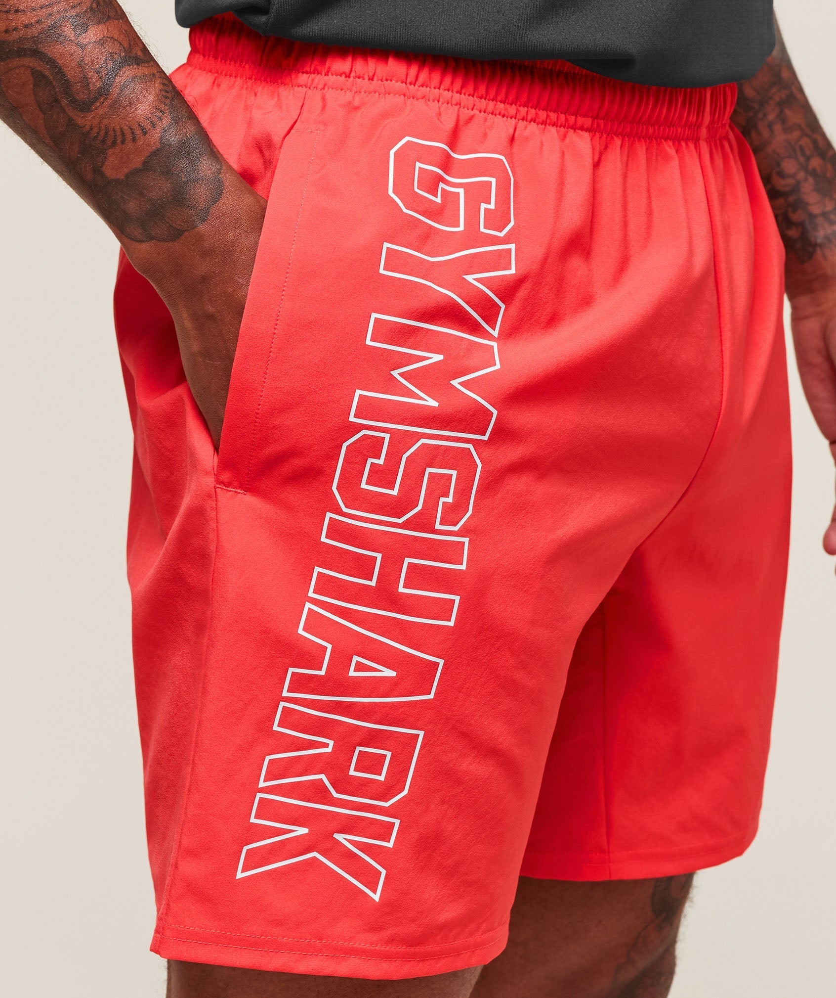 Gymshark Hybrid Athlete 7" Shorts - Coral Red